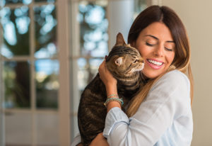 Health Benefits of Owning Pets - Woman Loving Her Cat
